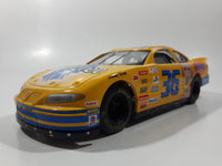 1998 Racing Champions NASCAR #36 Ernie Irvan Pontiac Grand Prix Pedigree Whiskas M & M's Uncle Ben's Yellow 1/24 Scale Die Cast Toy Race Car Vehicle