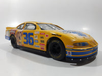 1998 Racing Champions NASCAR #36 Ernie Irvan Pontiac Grand Prix Pedigree Whiskas M & M's Uncle Ben's Yellow 1/24 Scale Die Cast Toy Race Car Vehicle