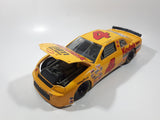 1995 Racing Champions NASCAR #4 Sterling Marlin Chevrolet Monte Carlo Kodak Film Yellow 1/18 Scale Die Cast Toy Race Car Vehicle with Opening Hood