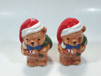 Vintage Brown Teddy Bear in Santa Claus Hat with Candy Cane Christmas Themed 4 1/4" Tall Ceramic Salt and Pepper Shaker Set