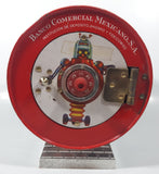 Vintage Banco Comercial Mexicano, S.A. Institucion De Deposito, Ahorro Y Fideicomiso Retro Space Age Cartoon Family and Robot Graphics with Rear Clock Hands 7 1/2" Tall Tin Metal Combination Coin Bank Safe Vault