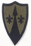 Vintage US Army Theater Army Support Command TASCOM Subdued Black on Olive Green 2" x 3 1/4" Fabric Patch Badge Insignia