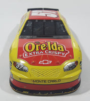 2003 Racing Champions NASCAR #57 Brian Vickers Chevrolet Monte Carlo Ore-Ida Extra Crispy Yellow and Red 1/24 Scale Die Cast Toy Car Vehicle