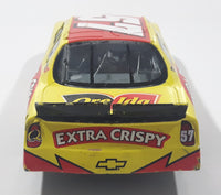 2003 Racing Champions NASCAR #57 Brian Vickers Chevrolet Monte Carlo Ore-Ida Extra Crispy Yellow and Red 1/24 Scale Die Cast Toy Car Vehicle