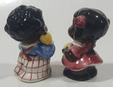 Rare Antique Black Americana Boy and Girl Holding Corn Cobs Cork Plug Ceramic Salt and Pepper Shakers