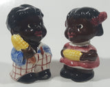 Rare Antique Black Americana Boy and Girl Holding Corn Cobs Cork Plug Ceramic Salt and Pepper Shakers