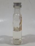 Vintage Empress Pure Almond Extract 2 FL Oz. 4 1/2" Tall Glass Spice Jar Half Full