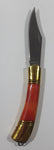 Vintage Red Orange Lava Colored Celluloid and Brass Metal Handle Folding Stainless Steel Pocket Knife