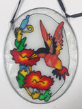 Hummingbird Feeding on Red Flowers Oval Shaped 5" x 6 3/4" Stained Glass Suncatcher