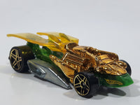 2010 Hot Wheels Insectirides Draggin' Tail Green and Chrome Gold Die Cast Toy Car Vehicle