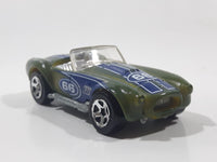 2011 Hot Wheels Color Shifters: Water Revealers Shelby Classic Cobra Convertible Army Green #66 Die Cast Toy Car Vehicle