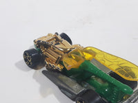 2010 Hot Wheels Insectirides Draggin' Tail Green and Chrome Gold Die Cast Toy Car Vehicle Busted Wing