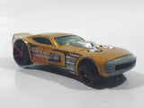 2007 Hot Wheels Nitro Doorslammer Aston Martin Metalflake Gold Die Cast Toy Car Vehicle