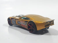 2007 Hot Wheels Nitro Doorslammer Aston Martin Metalflake Gold Die Cast Toy Car Vehicle