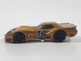 2020 Hot Wheels HW Race Way '76 Greenwood Corvette Metalflake Gold Die Cast Toy Car Vehicle