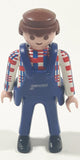 1990 Geobra Playmobil Man in Red and White Top with Blue Vest and Pants 2 3/4" Tall Toy Figure