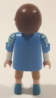 2012 Geobra Playmobil Man in Blue and Green Top with Tan Pants 2 3/4" Tall Toy Figure