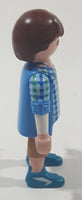 2012 Geobra Playmobil Man in Blue and Green Top with Tan Pants 2 3/4" Tall Toy Figure