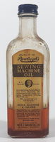 Antique Rawleigh's Sewing Machine Oil 4 1/2 Fluid Oz 6 1/2" Tall Glass Bottle with Paper Label