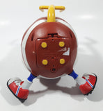 1999 Playmates Ooglies Gridiron Football Shaped 5 1/2" Tall Light Up Eyes Animated Moving Shaking Sound Making Toy Figure