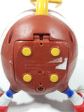 1999 Playmates Ooglies Gridiron Football Shaped 5 1/2" Tall Light Up Eyes Animated Moving Shaking Sound Making Toy Figure