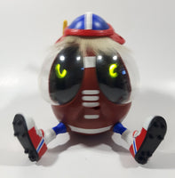 1999 Playmates Ooglies Gridiron Football Shaped 5 1/2" Tall Light Up Eyes Animated Moving Shaking Sound Making Toy Figure