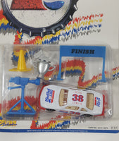 1990s Golden Wheel Special Edition Diet Pepsi Team Racer #38 Peter Comlia Die Cast Toy Race Car Vehicle with Trophy, Camera, Pylon, and Finish Line New in Package