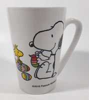 2016 Peanuts Worldwide Snoopy and Woodstock Decorating Easter Eggs 5" Tall Ceramic Mug Cup