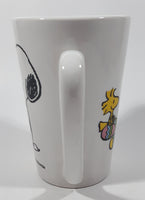 2016 Peanuts Worldwide Snoopy and Woodstock Decorating Easter Eggs 5" Tall Ceramic Mug Cup